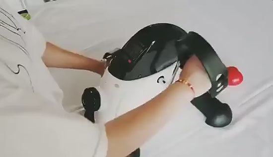 Valkoinen TerveysVoima minikuntopyörä LED-näytöllä jalkojen ja käsien harjoittamiseen kotona ja toimistolla